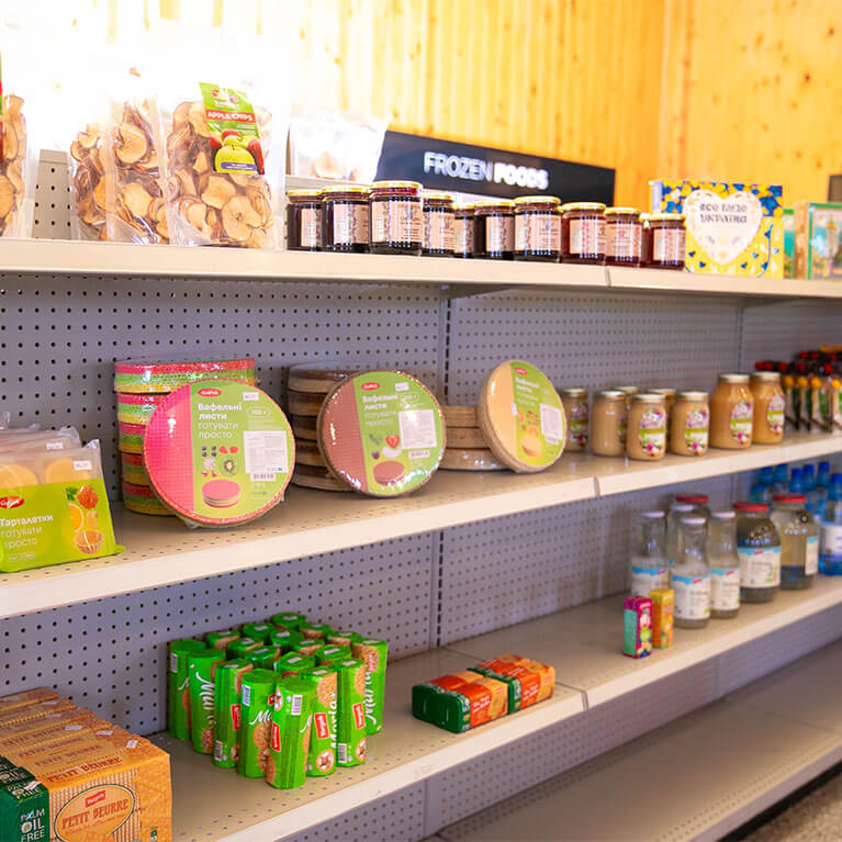Grocery store shelves with assorted packaged food items