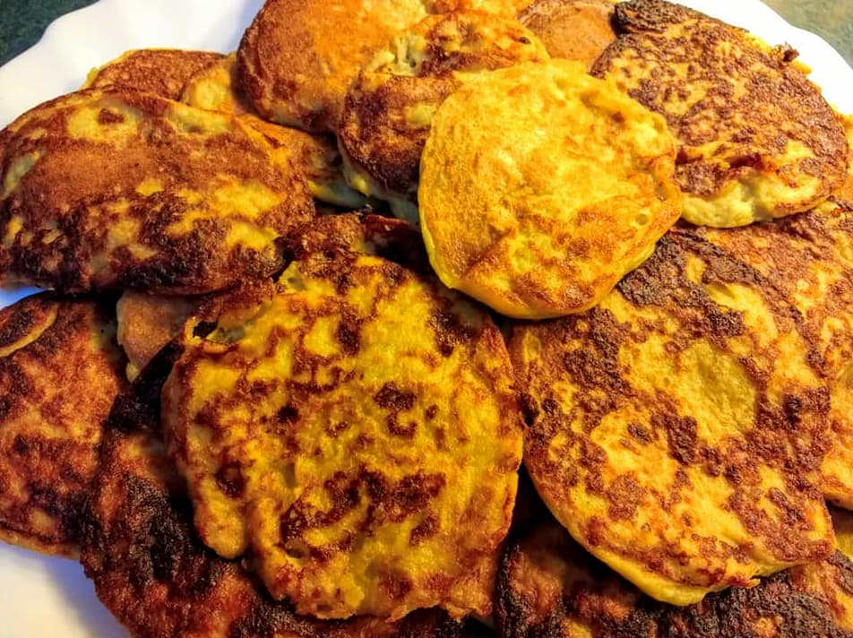 Plate of golden brown homemade pancakes
